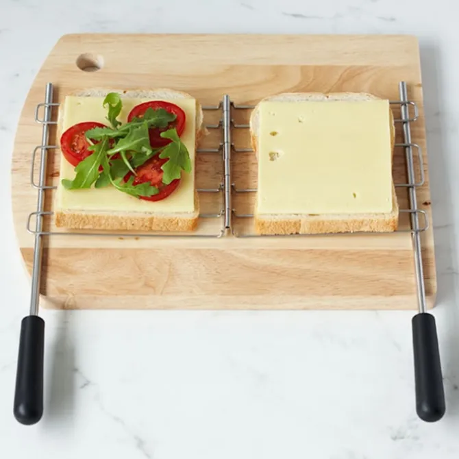 Klassisk brødrister vannkoker og toaststativ