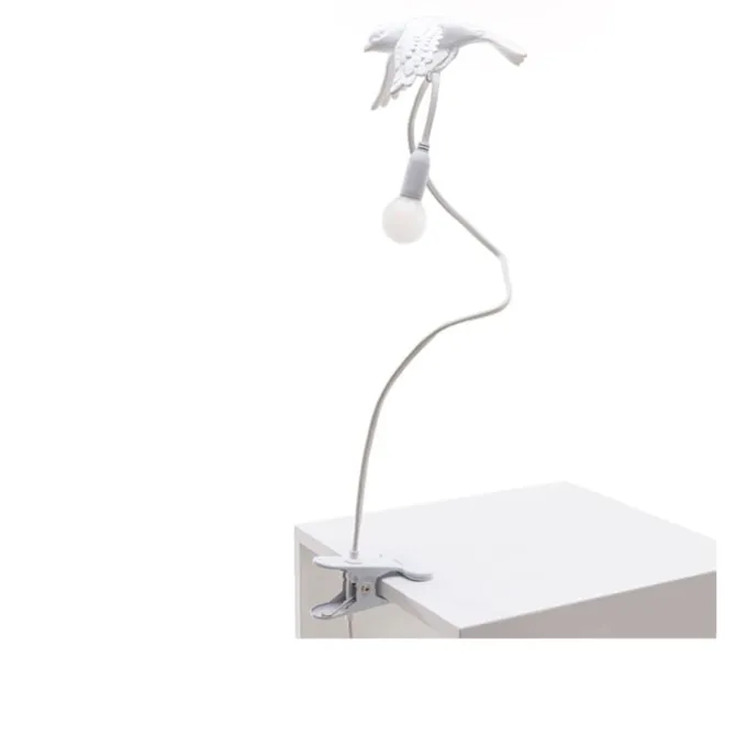 Sparrow Taking Off Lamp With Clamp